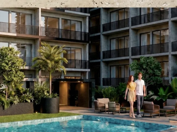 Render de la alberca y el edificio – departamento de 2 recámaras en preventa en Playa del Carmen